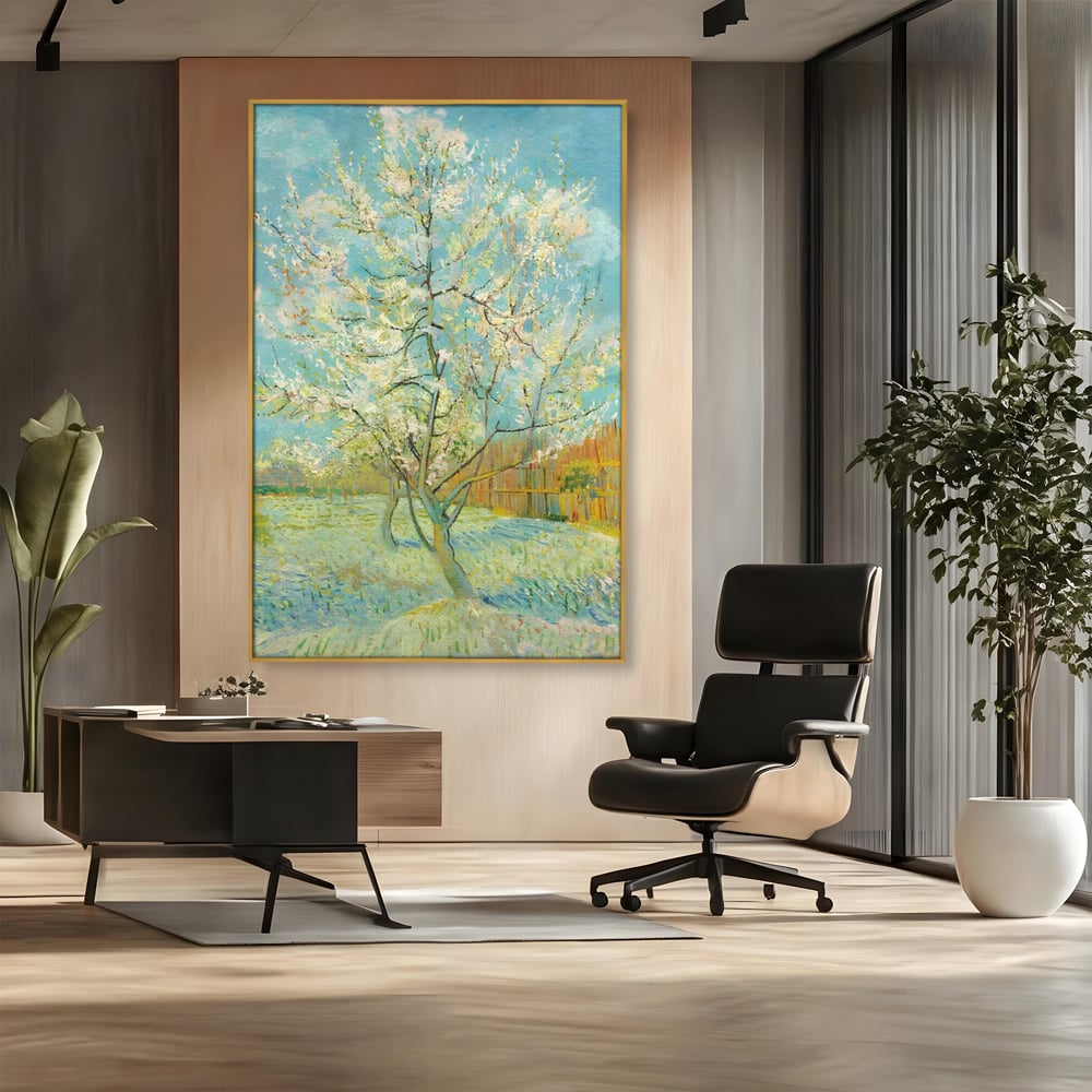 Tablou canvas cu pictura cu un copac inflorit primavara, in rama de aluminiu auriu, pe perete intr-un birou